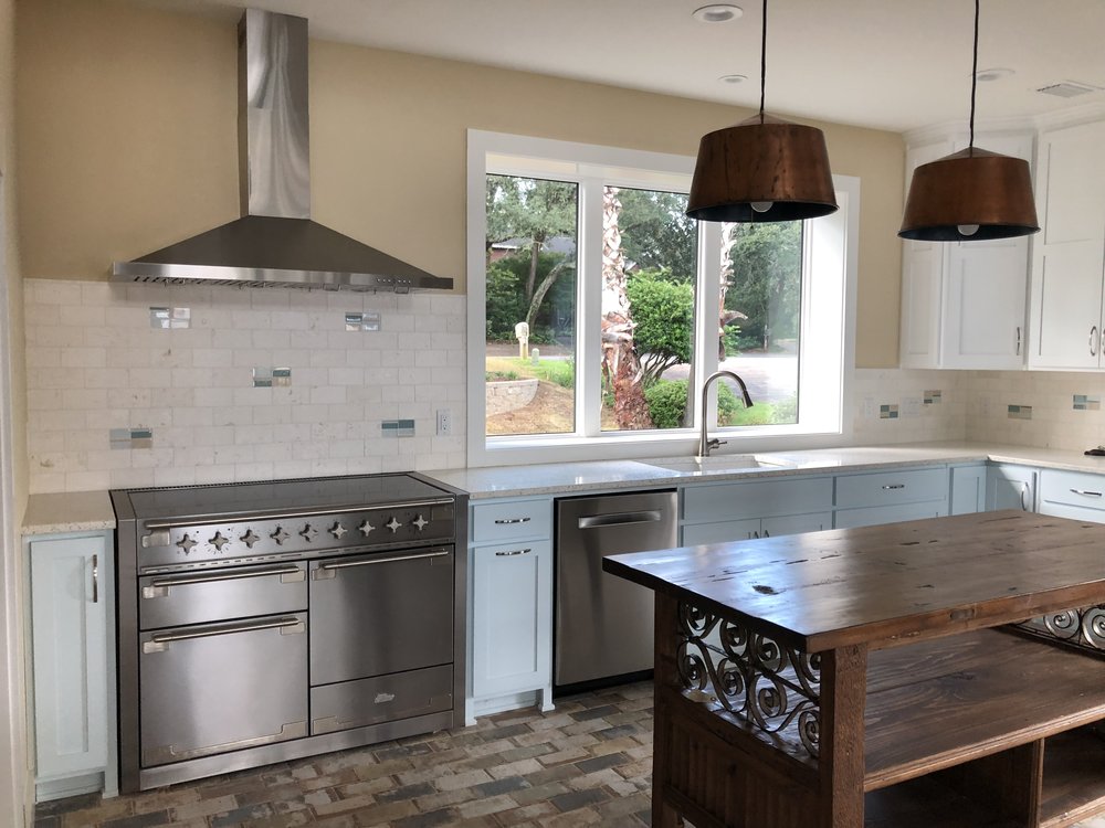 Premium wood grain and cabinet hardware details